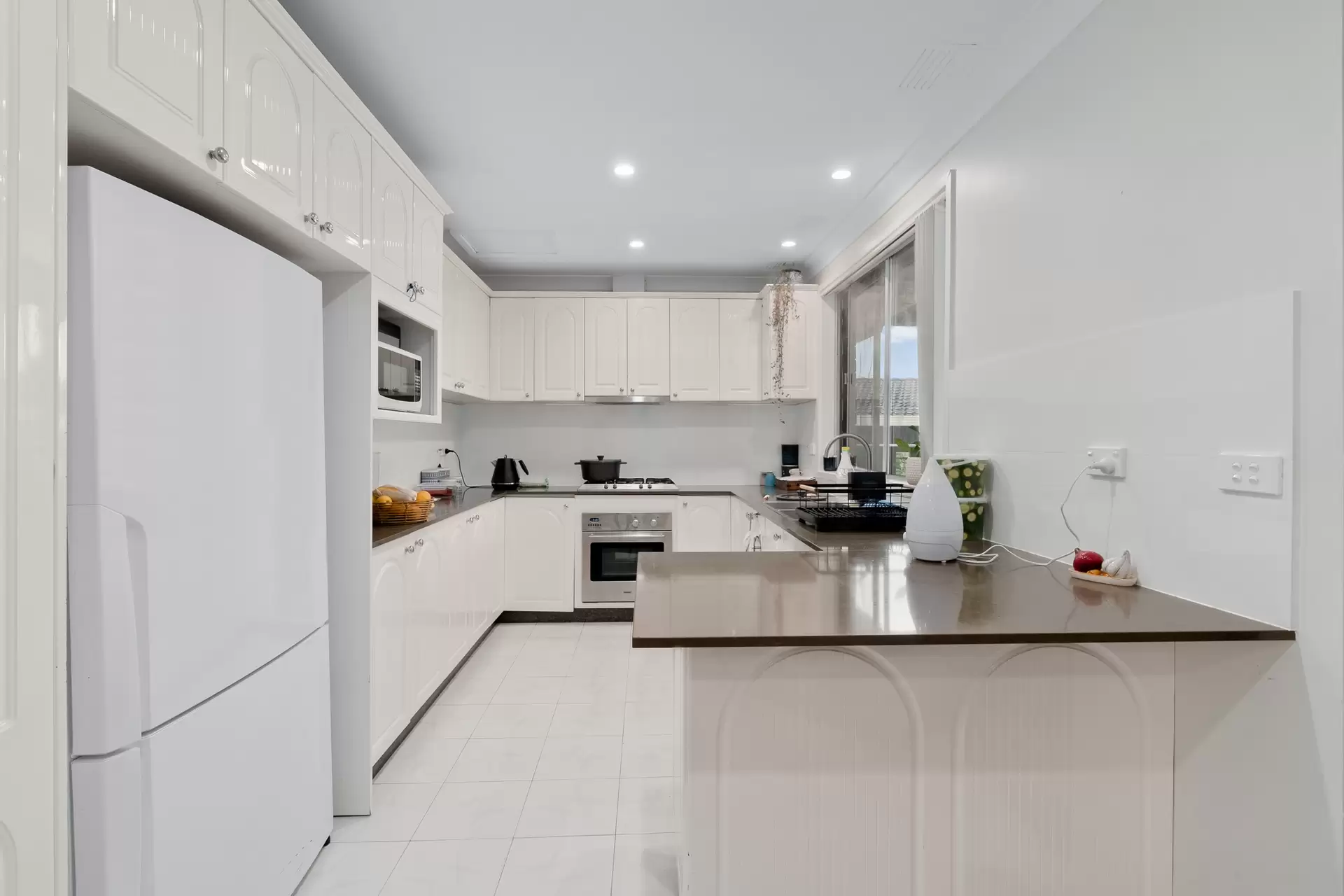 23 Jacaranda Drive, Georges Hall Sold by Richard Matthews Real Estate - image 2